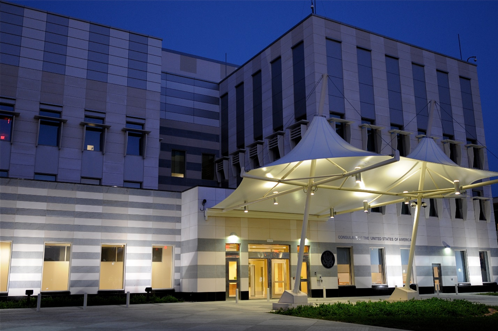 usa building with canopy over entryway 
