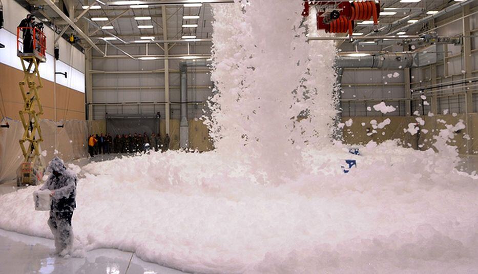 man with room full of foam